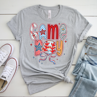 Game Boy Baseball Lettered Top - red white and blue Game Boy lettering with baseball, stars, and bow on a Heather Grey Bella Canvas tee
