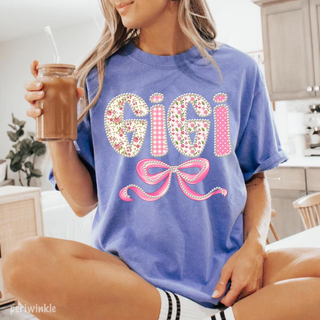 Periwinkle Comfort Colors tee with Gigi floral gingham polka dot pearl lettering and pink bow design front view