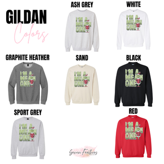 Green Man I'm a Mean One Gildan color chart showing Ash Grey, White, Graphite Heather, Sand, Black, Sport Grey, and Red sweatshirts with the graphic