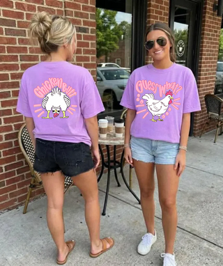 Violet Comfort Colors tee showing Guess What front and Chicken Butt back graphic

