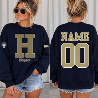 Woman wearing a navy personalized Hayden Wildcats crewneck sweatshirt with an H initial and name on the front and a name and number on the back