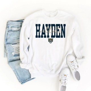 White crewneck sweatshirt with Hayden Wildcats Script Overlay design featuring bold block Hayden text with wildcats gold script overlay and wildcat mascot face below