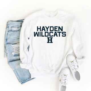 White crewneck sweatshirt with Hayden Wildcats two line logo graphic featuring stacked navy block letter Hayden Wildcats text with H logo underneath
