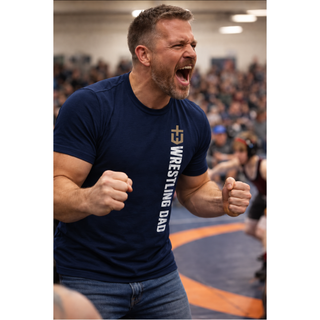 Navy shirt with a gold Wildcats logo above vertical white WRESTLING DAD lettering.