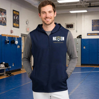 Model wearing a navy sleeveless hooded quarter-zip with white Hayden lettering, a gold and navy wildcat head, and gold Wrestling lettering on the left chest
