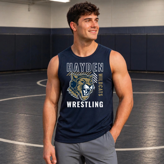Hayden Wildcats Wrestling Headgear Logo men's PosiCharge Competitor tank in navy, on-model shot in a wrestling gym showing the bold outlined Hayden lettering, diagonal gold and white striped bar, growling wildcat head wearing a headgear strap, vertical Wildcats lettering, and bold Wrestling lettering