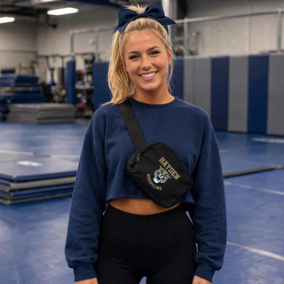 Hayden Wildcats Wrestling Mascot Logo belt bag in black, worn crossbody on-model