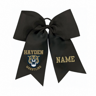 Hayden Wildcats Wrestling Mascot Logo personalized cheer bow in black, flat lay with NAME placeholder on the second tail