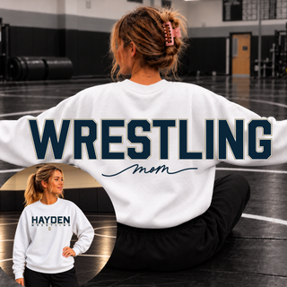 White Gildan sweatshirt featuring the Hayden Wildcats Wrestling design on the front and oversized Wrestling Mom lettering on the back; crewneck and hoodie shown.