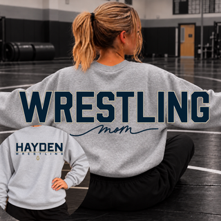 Sport Grey Gildan sweatshirt with the Hayden Wildcats Wrestling design on the front and oversized Wrestling Mom lettering on the back; crewneck and hoodie shown.