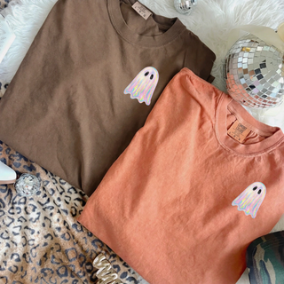 Comfort Colors espresso and yam tees with holographic iridescent left chest ghost graphic design
