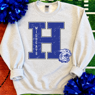 Holton Wildcats distressed letter H design in royal blue on a heather grey crewneck sweatshirt