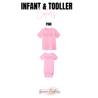 Pink infant onesie and toddler tee with In October We Wear Pink lettering design
