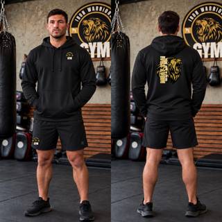 Man in a black performance hoodie with the lion crest on the chest and a roaring gold lion with Muay Thai on the back