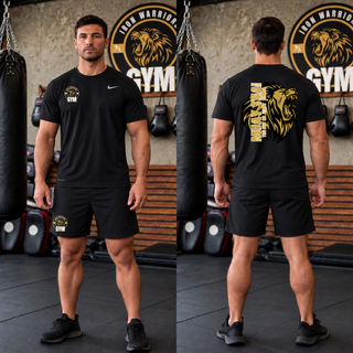 Model wearing the Iron Warriors Gym Art of Eight Limbs rLegend Tee in Black, front lion crest and back gold lion head with Muay Thai lettering