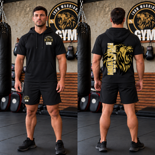 Model wearing the Iron Warriors Gym Art of Eight Limbs Short Sleeve Hooded Pullover in Black, front lion crest and back gold lion head with Muay Thai lettering