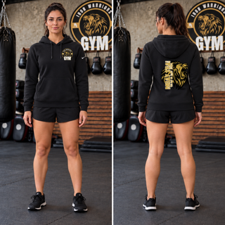 Model wearing the Iron Warriors Gym Art of Eight Limbs Women's Club Fleece Pullover Hoodie in Black, front lion crest and back gold lion head with Muay Thai lettering