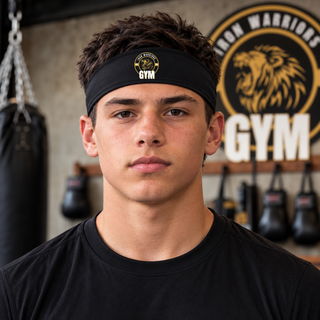 Young athlete wearing a black headband with the Iron Warriors Gym lion crest on the front