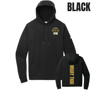 Black pocket pullover hoodie flat lay with the Iron Warriors Gym lion crest on the left chest and Muay Thai in gold vertical lettering on the back