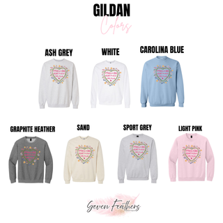Gildan Big Heart Little Minds crewneck in ash grey, white, carolina blue, graphite heather, sand, sport grey, and light pink
