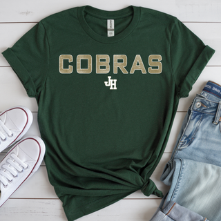 Jackson Heights Cobras Block Letter Top in forest green with bold COBRAS lettering and JH monogram detail