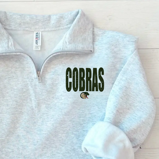 Jackson Heights Cobras Distressed Mascot NuBlend Fleece Quarter-Zip in ash grey, close-up flat lay showing distressed Cobras graphic and cobra mascot logo