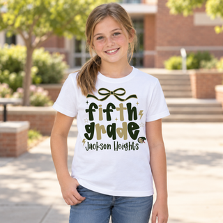 Jackson Heights Cobras Fifth Grade Bow Top modeled on a girl, white tee with bow accent and fifth grade Jackson Heights design