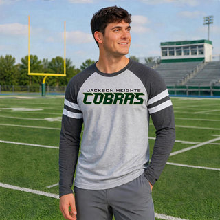 Model wearing Jackson Heights Cobras Slant football logo Mash Up long sleeve top in Vintage Heather and Vintage Smoke