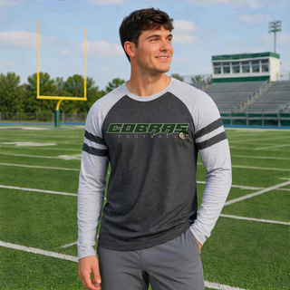 Model wearing Jackson Heights Cobras Slant football logo Mash Up long sleeve top in Vintage Smoke and Vintage Heather