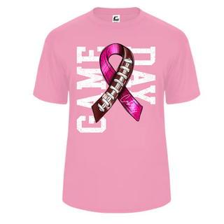 Bright pink Jackson Heights Jr. Cobras performance top with distressed Game Day lettering and a pink ribbon wrapped around a football