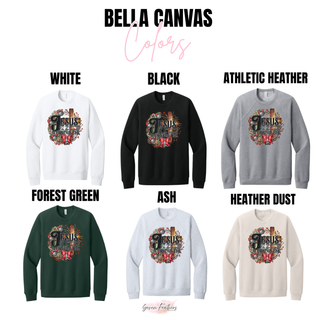 Bella Canvas color chart showing the Jesus At Christmas Time design on sweatshirts in white, black, athletic heather, forest green, ash, and heather dust
