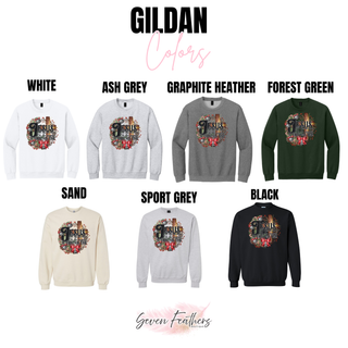 Gildan color chart showing the Jesus At Christmas Time design on sweatshirts in white, ash grey, graphite heather, forest green, sand, sport grey, and black