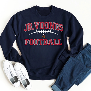 Navy crewneck sweatshirt with Jr. Vikings Football classic lace arch graphic, styled with jeans and white sneakers
