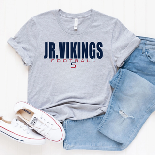 Athletic heather tee with Jr. Vikings Football kickoff graphic in navy and red, styled with jeans and white Converse
