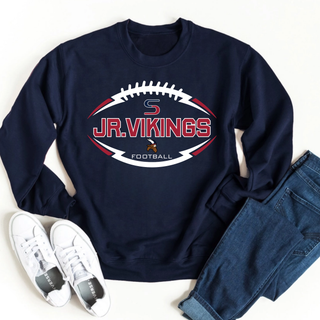 Navy crewneck sweatshirt with Jr. Vikings Football Sideline Top design featuring football laces outline, S logo, and viking mascot, styled with jeans and sneakers