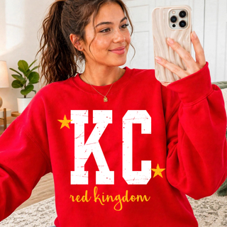KC Distressed Red Star Top - red crewneck with distressed white KC lettering, gold stars, and red script accent