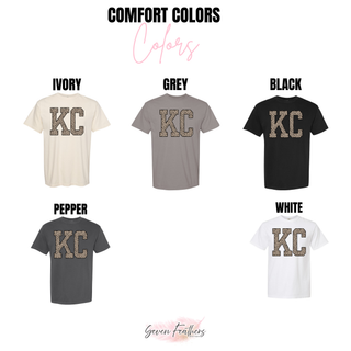 Comfort Colors tees in ivory, grey, black, pepper, and white with KC lettering in leopard print and black outline