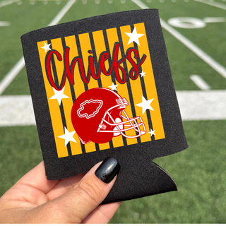 black koozie with red gold stripes and white stars, kc red helmet graphic, held in hand on football field