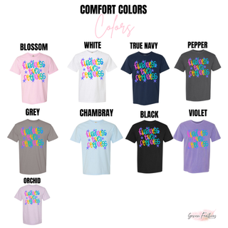 Kindness over coolness graphic tee Comfort Colors options in blossom, white, true navy, pepper, grey, chambray, black, violet, and orchid
