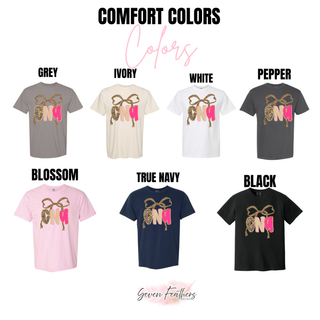 Comfort Colors CNA tops in grey, ivory, white, pepper, blossom, true navy, and black with leopard bow and pink CNA lettering
