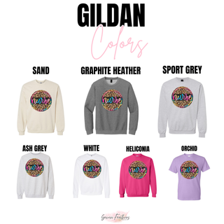 Gildan leopard nurse graphic top color options in sand, graphite heather, sport grey, ash grey, white, heliconia, and orchid
