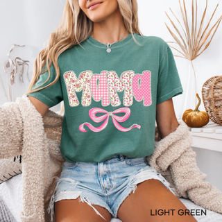 Light green Comfort Colors tee with Mama floral gingham polka dot pearl lettering and pink bow design front view