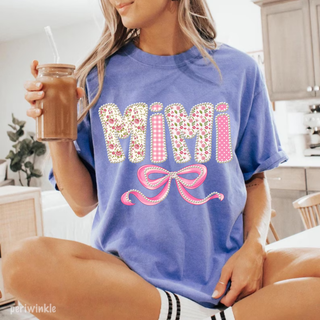 Periwinkle Comfort Colors tee with Mimi floral gingham polka dot pearl lettering and pink bow design front view
