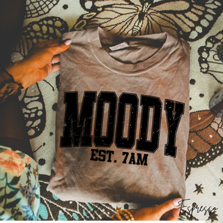 Comfort Colors espresso tee with black distressed varsity Moody Est. 7AM lettering
