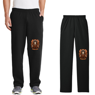 Man wearing black core fleece sweatpants with pockets and the Ogden's Outlaws Wrestling feathered skull and crossed axes graphic on the lower leg, next to a flat lay