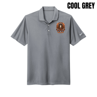 Cool Grey Dri-FIT Micro Pique 2.0 polo with a left chest feathered skull and crossed axes Ogden's Outlaws Wrestling logo