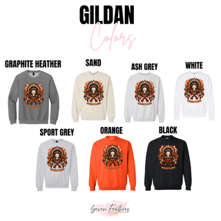 Gildan crewneck color chart with the Ogden's Outlaws Wrestling feathered skull graphic in Graphite Heather, Sand, Ash Grey, White, Sport Grey, Orange, and Black