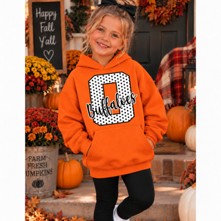 Girl in an orange hoodie with a white polka dot letter O outlined in black and black Buffaloes script on the front, with plain sleeves, standing on a fall porch with pumpkins
