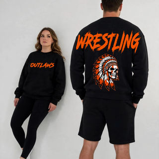Woman in a black crewneck with Outlaws in orange brush lettering on the front beside a man showing the back with large orange Wrestling lettering above a feathered skull