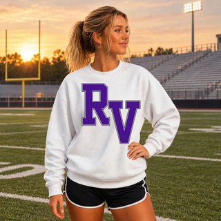 Woman wearing the white Royal Valley Panthers crewneck sweatshirt from the front, showing the purple RV initial on the front chest